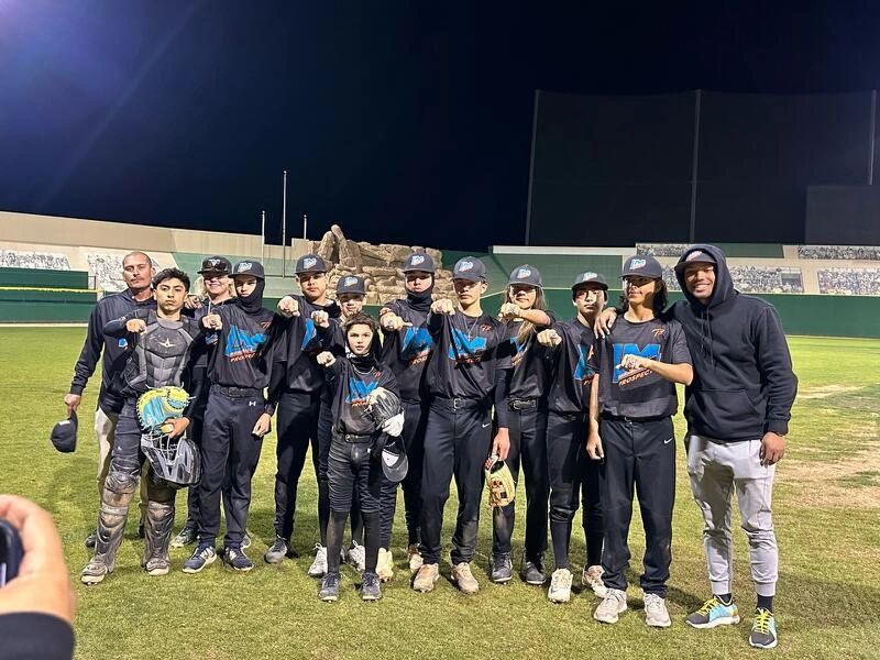 Team in black uniforms night game