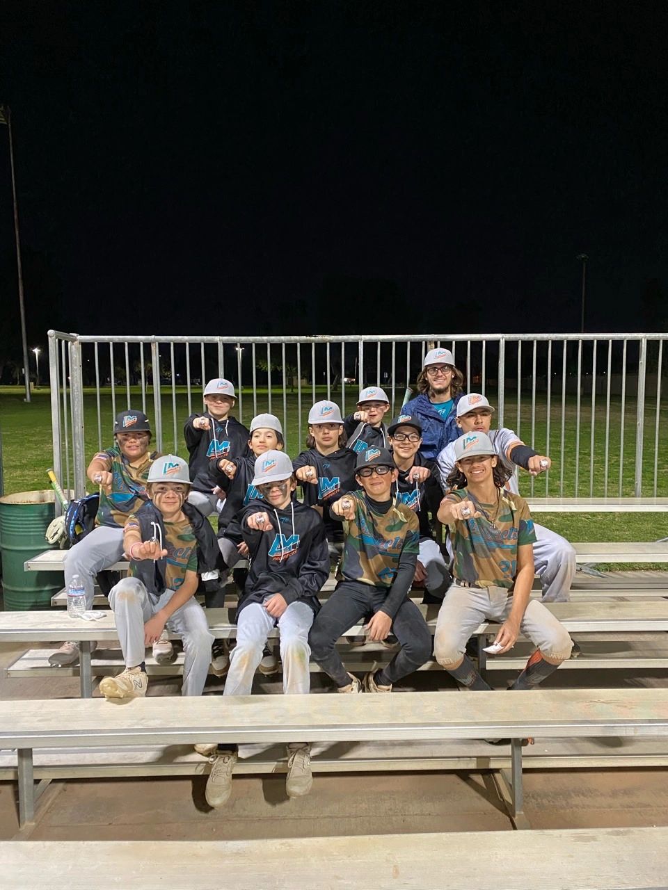 Team photo on bleachers